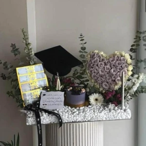 ستاند خريجتنا غير - مع الكيك الكوري