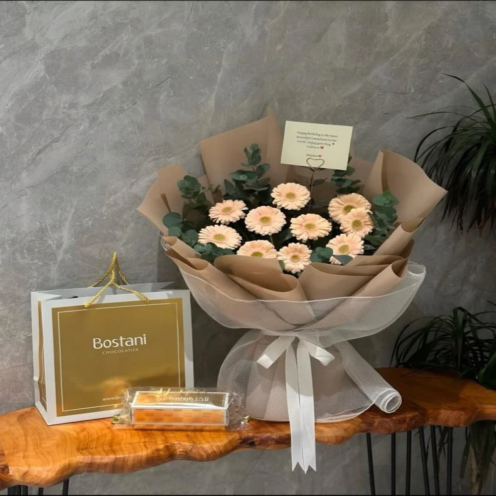 باقة بيور - ورد جيربيرا مع شوكولاتة بستاني